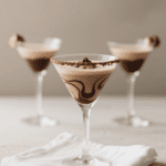 The German Chocolate Cake Martini is the ideal dessert cocktail recipe. It combines the flavors of a classic dessert with a cocktail, recreating the experience of taking a bite out of your favorite cake in a martini glass.