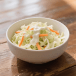 This Raising Cane’s Coleslaw Recipe is super easy to make, cool and creamy, and crisp and fresh, with cabbage and a smooth dressing for a tangy-sweet side you can feel good about making at home.