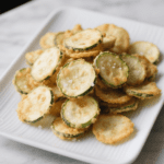 This North Italia Zucca Chips Recipe is super easy to make, crisp and light, and full of flavor, with summer squash seasoned with herbs and spices for a delicious snack you can feel good about making at home.