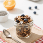 This healthy granola recipe uses dried blueberries, oats, and orange zest. Honey sweetens it and adds the sweetness and crunch.